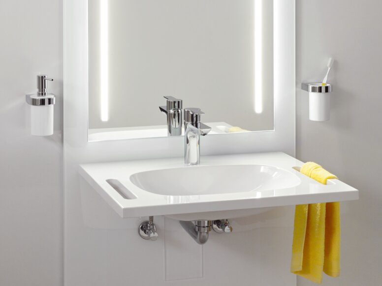 Height-adjustable washbasin with mirror
