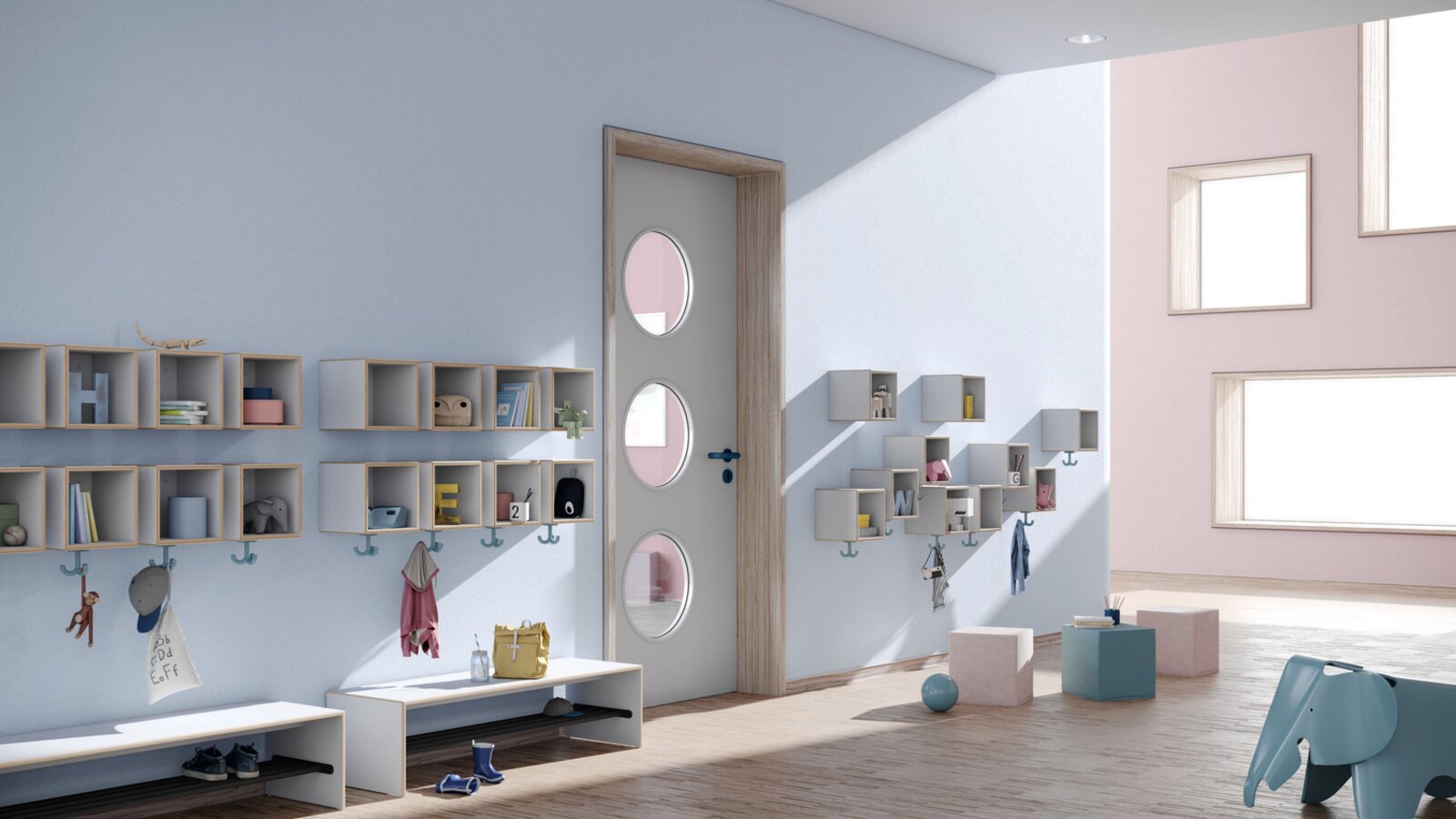 Blue kindergarten hallway with wall-mounted coat racks, triple hooks and seating